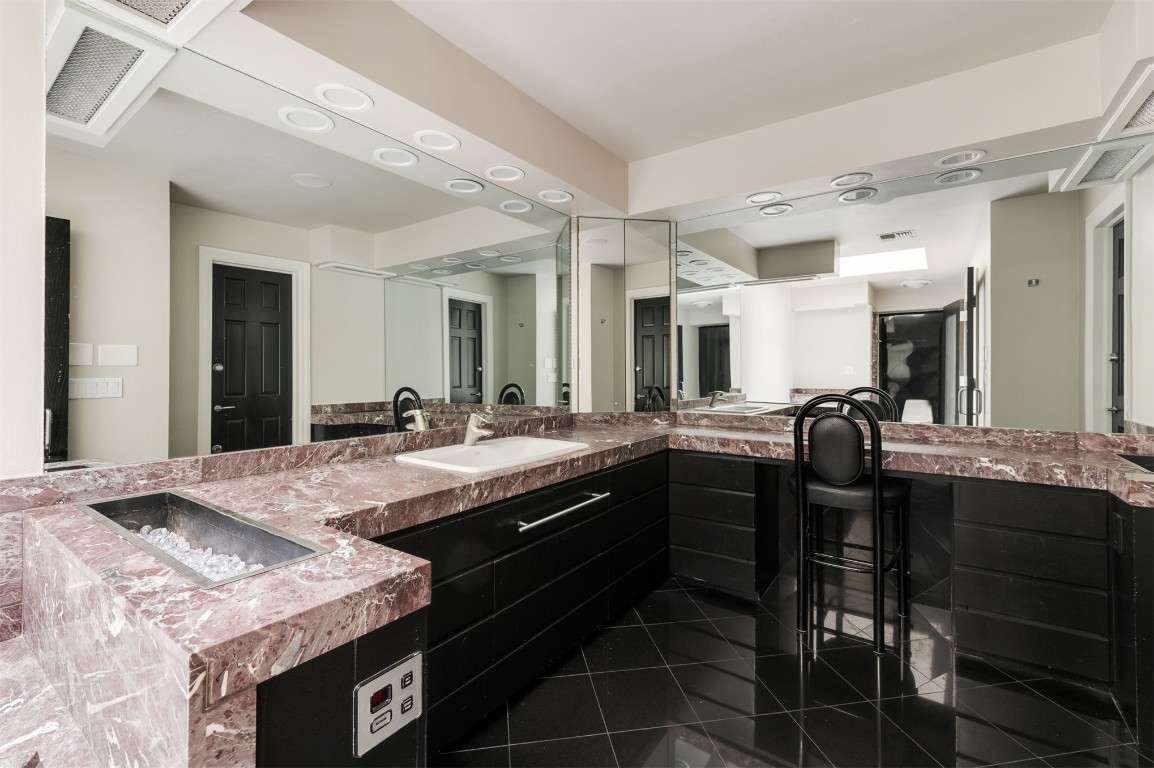 3109 NW 63rd Street, #39, Oklahoma City, OK 73116 bathroom featuring tile floors and vanity