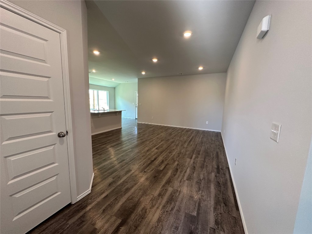 6233 Holm Oak Road, Edmond, OK 73034 unfurnished living room featuring carpet flooring