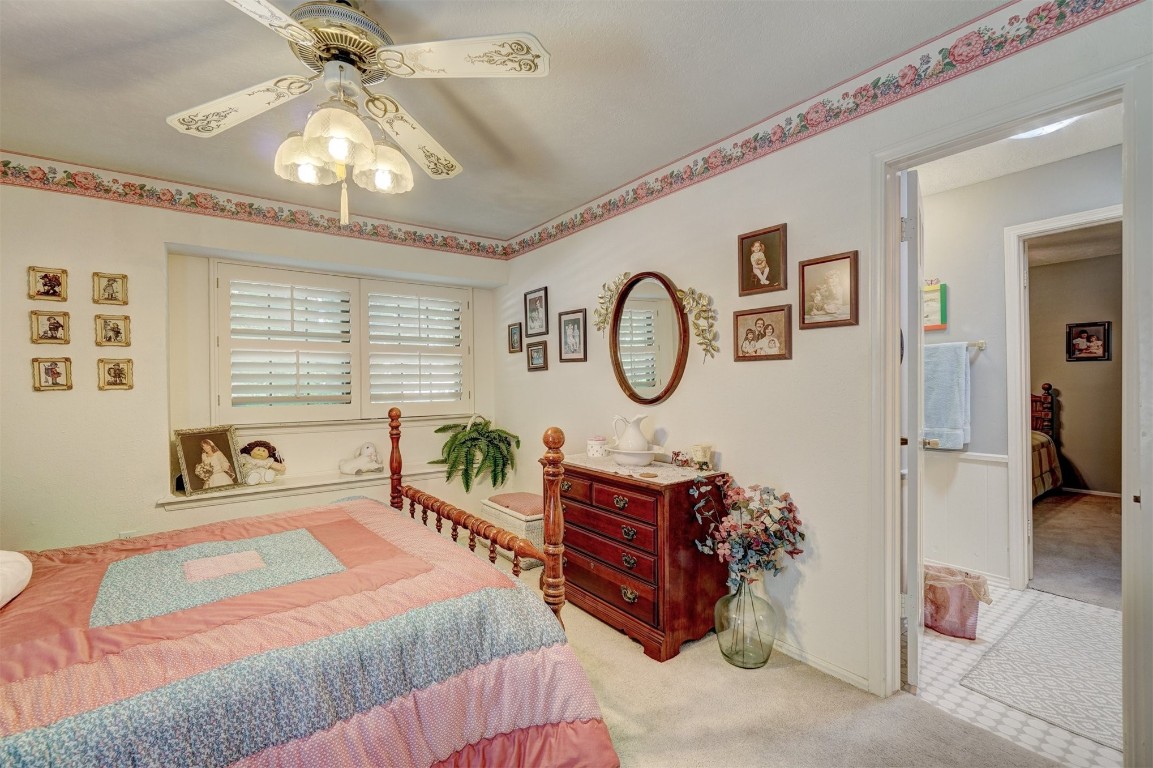 1707 Northcliff Avenue, Norman, OK 73071 carpeted bedroom featuring ceiling fan