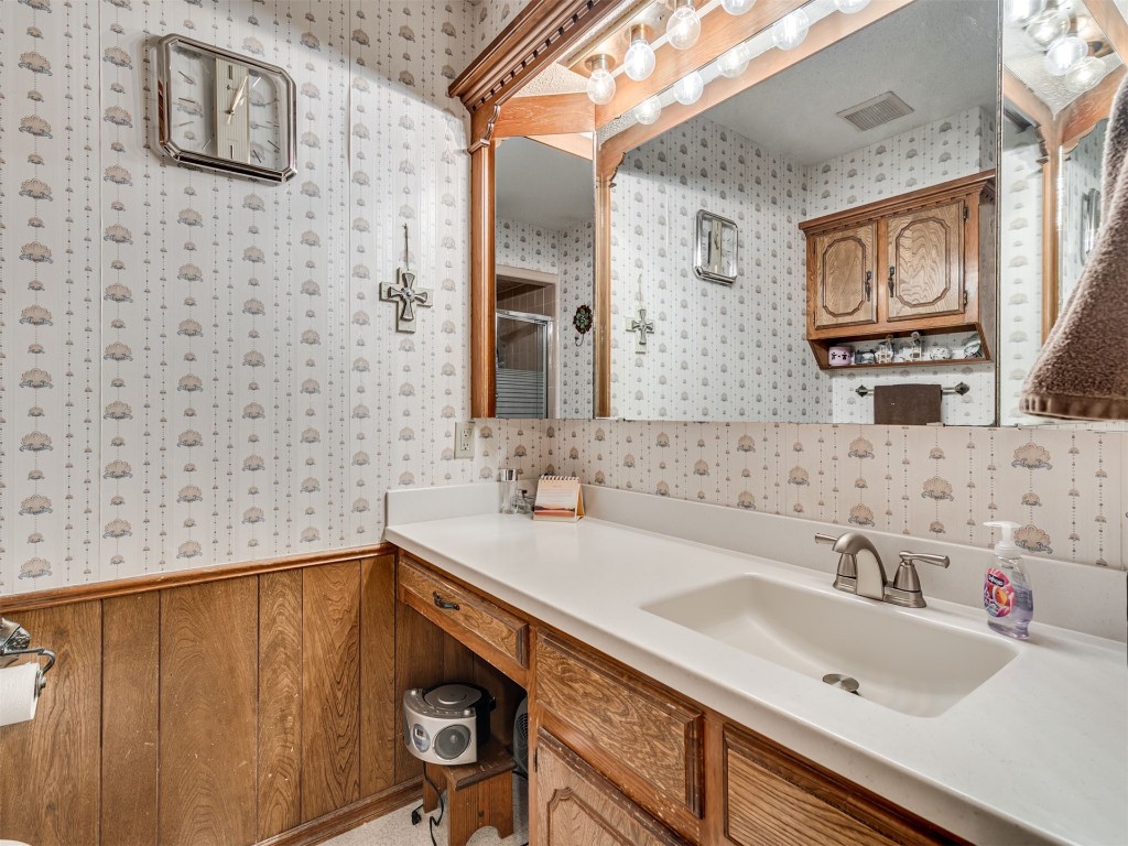 708 Waterview Road, Oklahoma City, OK 73170 bathroom with vanity with extensive cabinet space