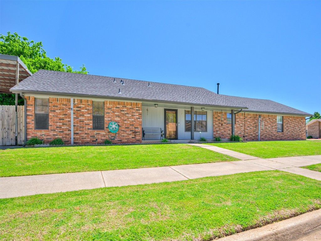708 Waterview Road, Oklahoma City, OK 73170 single story home featuring a front lawn