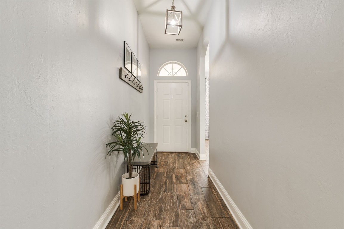 11512 Devonbrook Court, Midwest City, OK 73130 entryway featuring dark hardwood / wood-style flooring