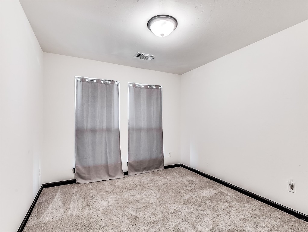 12613 NW 4th Terrace, Yukon, OK 73099 empty room with carpet