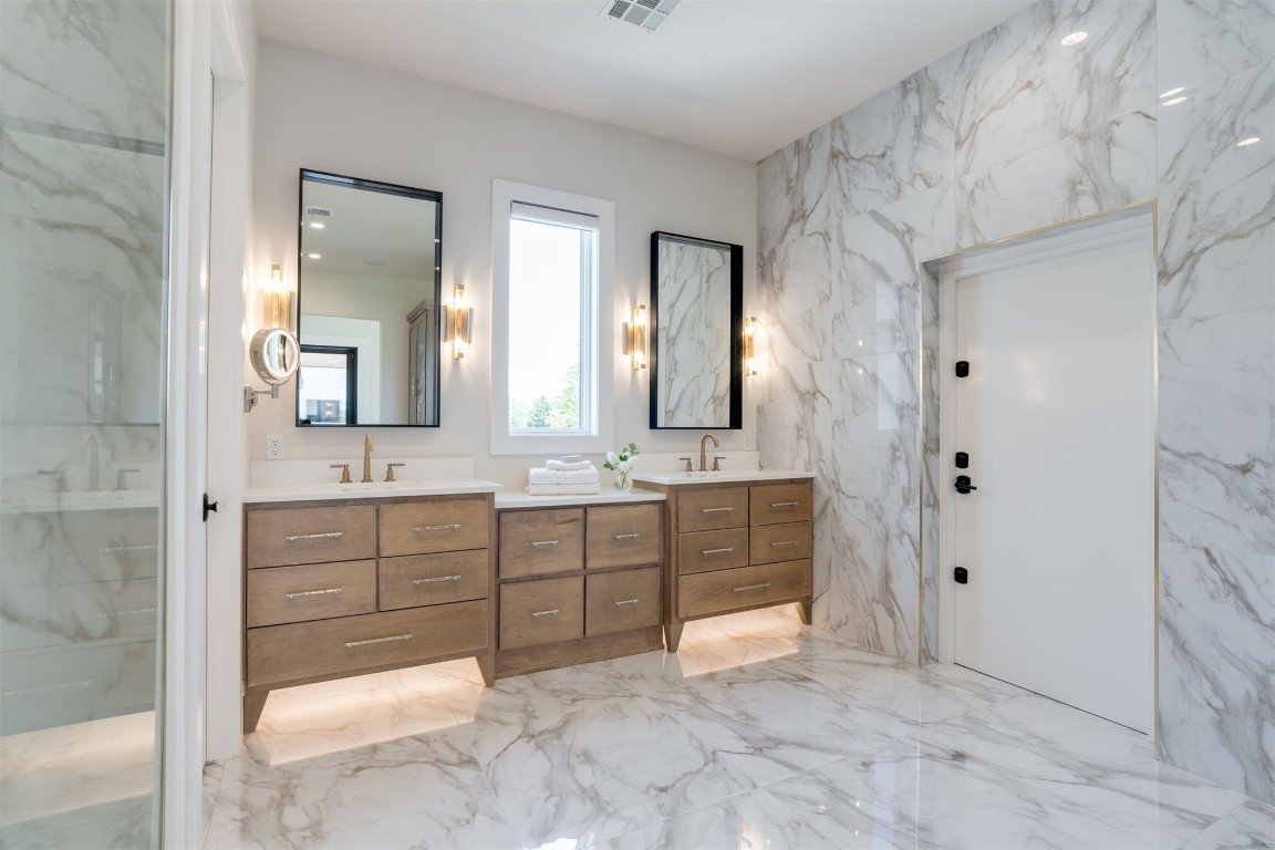 17000 N Anderson Road, Arcadia, OK 73007 bathroom with an enclosed shower, vanity, and tile floors