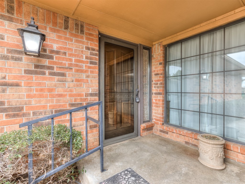 9610 Warringer Court, Oklahoma City, OK 73162 view of doorway to property