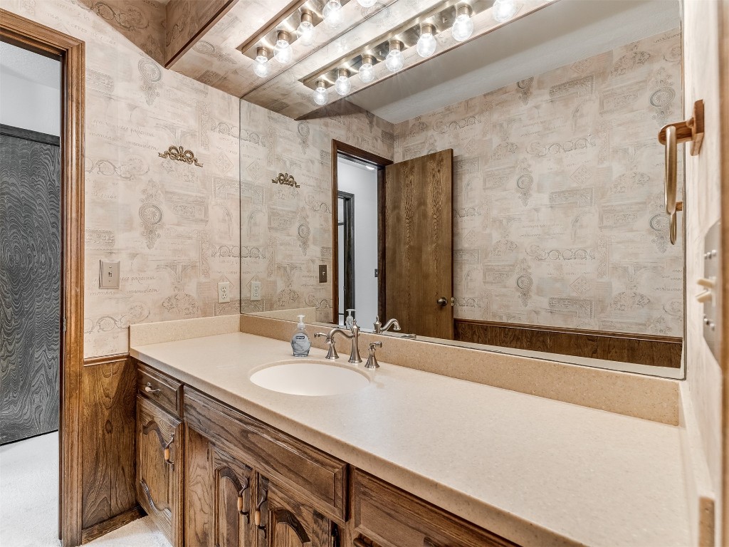 9610 Warringer Court, Oklahoma City, OK 73162 bathroom featuring large vanity