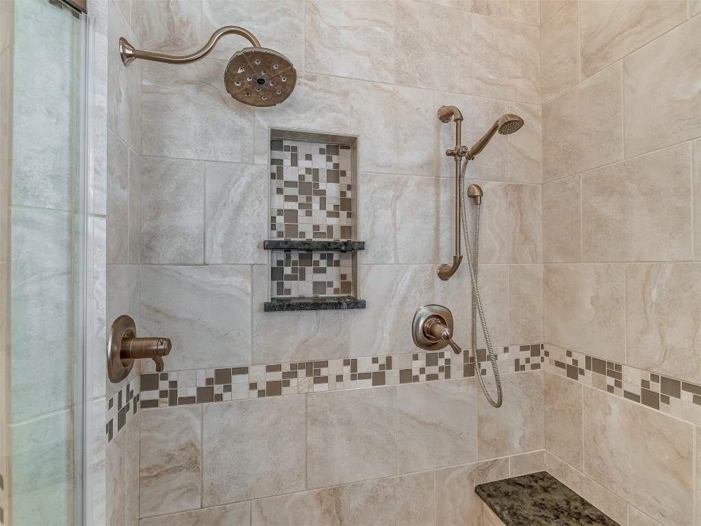 15608 Traditions Boulevard, Edmond, OK 73013 bathroom featuring tiled shower