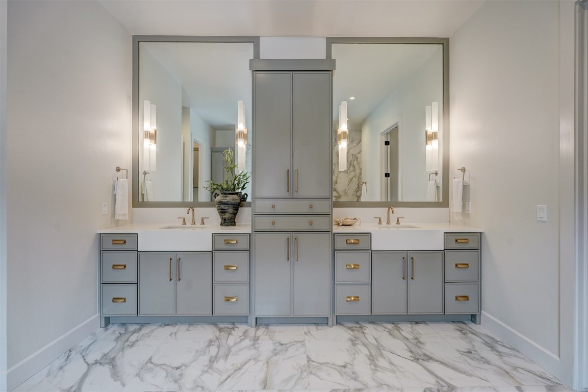 6309 Canopy Lane, Edmond, OK 73025 bathroom featuring tile floors and double sink vanity