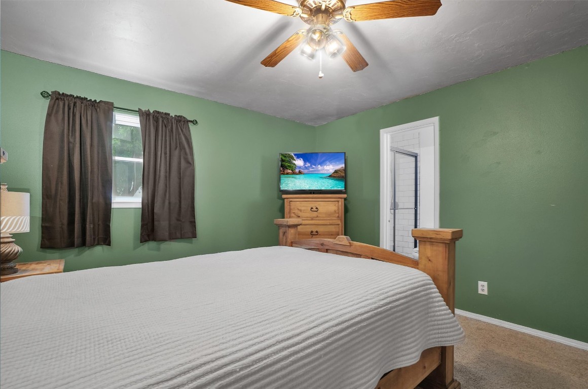 505 Libra Street, Altus, OK 73521 carpeted bedroom with ceiling fan
