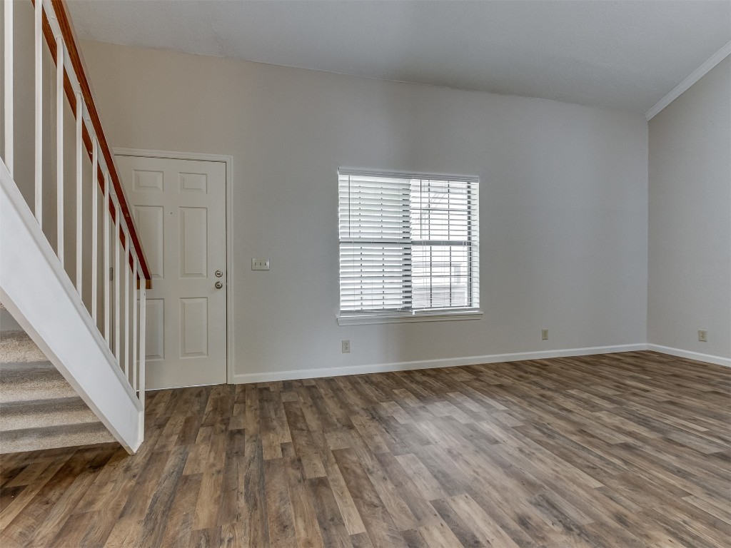 11130 Stratford Drive, #412, Oklahoma City, OK 73120 entryway featuring dark hardwood / wood-style flooring