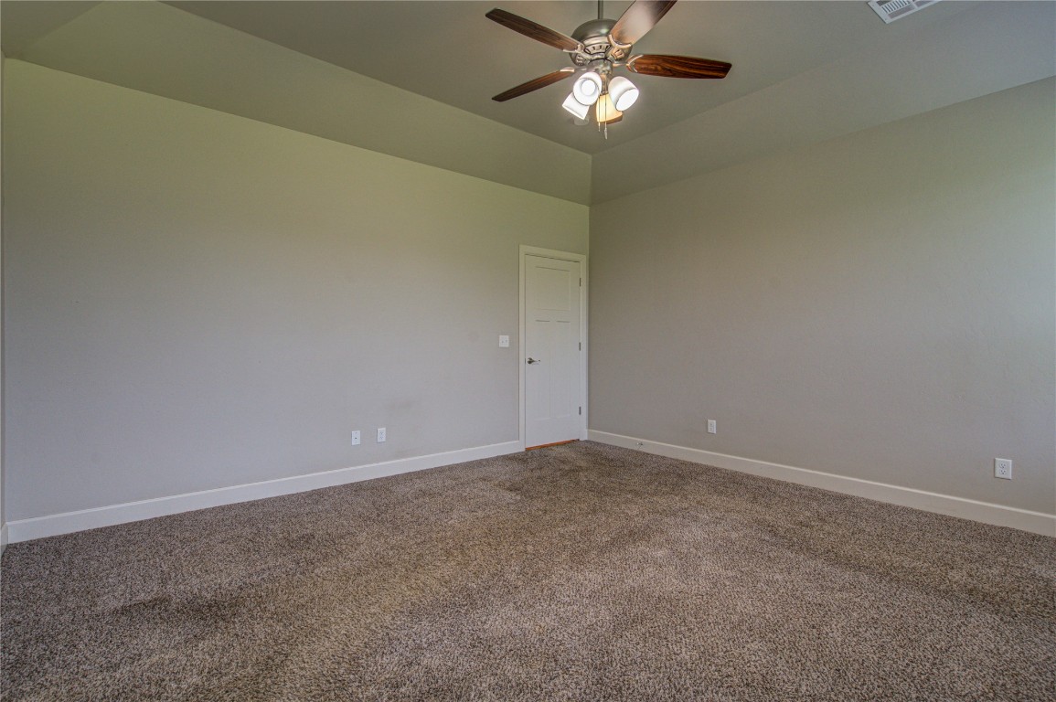 201 Casey Lane, Washington, OK 73093 carpeted empty room featuring ceiling fan
