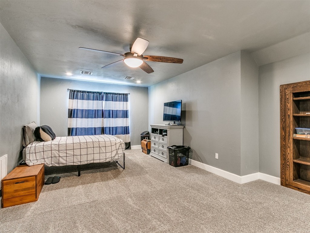 835 County Street 2922, Tuttle, OK 73089 bedroom featuring ceiling fan and carpet