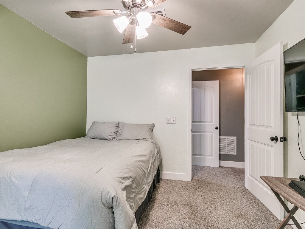 835 County Street 2922, Tuttle, OK 73089 carpeted bedroom with ceiling fan