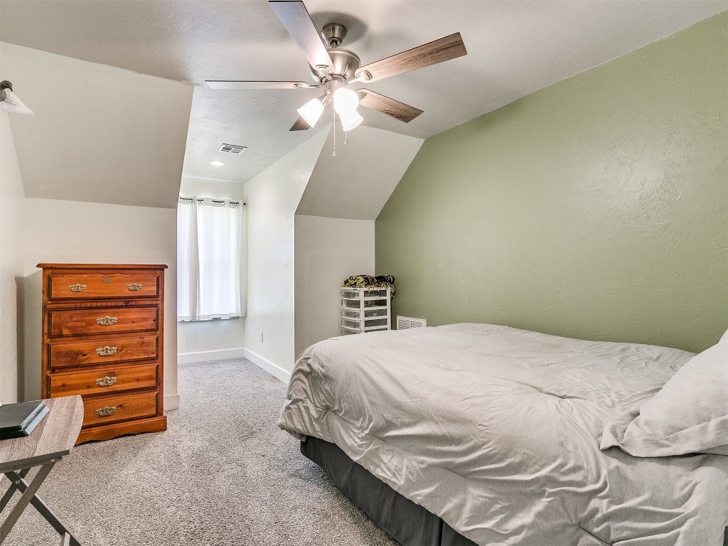 835 County Street 2922, Tuttle, OK 73089 bedroom with carpet, ceiling fan, and lofted ceiling