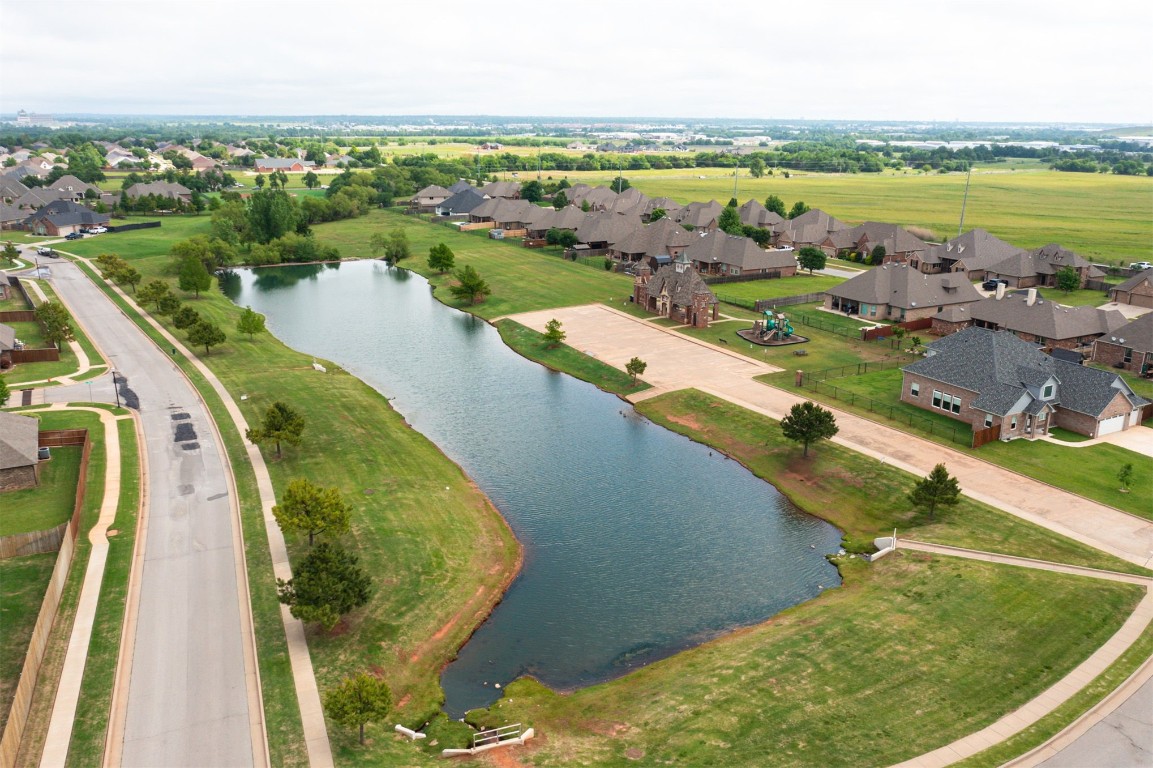 9324 SW 31st Street, Oklahoma City, OK 73179 drone / aerial view featuring a water view