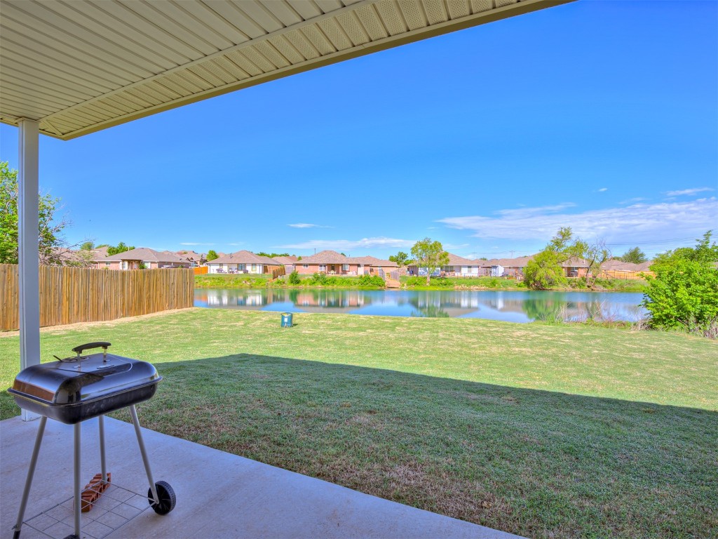 10009 Wessex Drive, Yukon, OK 73099 view of yard with a water view