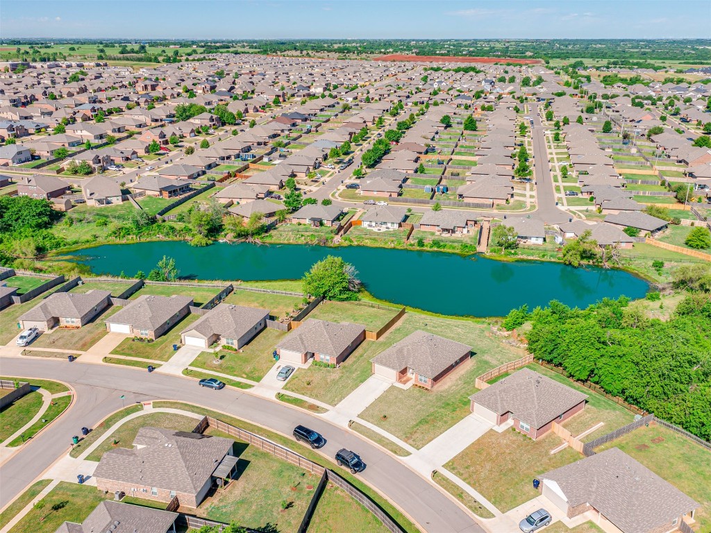 10009 Wessex Drive, Yukon, OK 73099 drone / aerial view with a water view