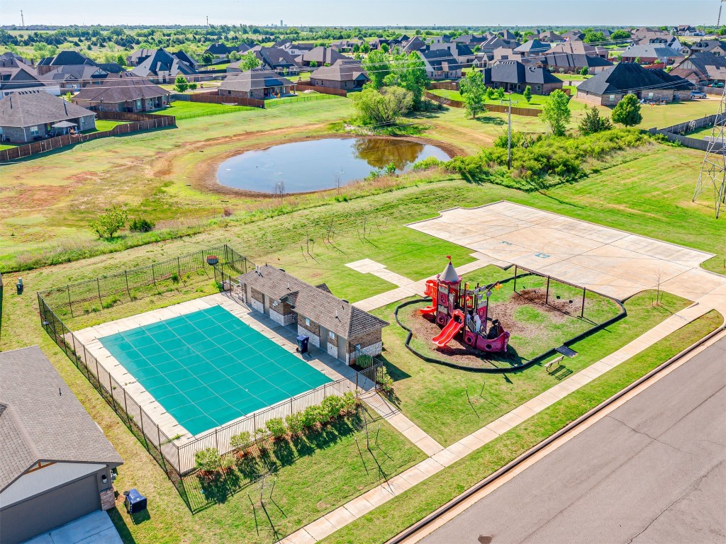 10009 Wessex Drive, Yukon, OK 73099 birds eye view of property featuring a water view