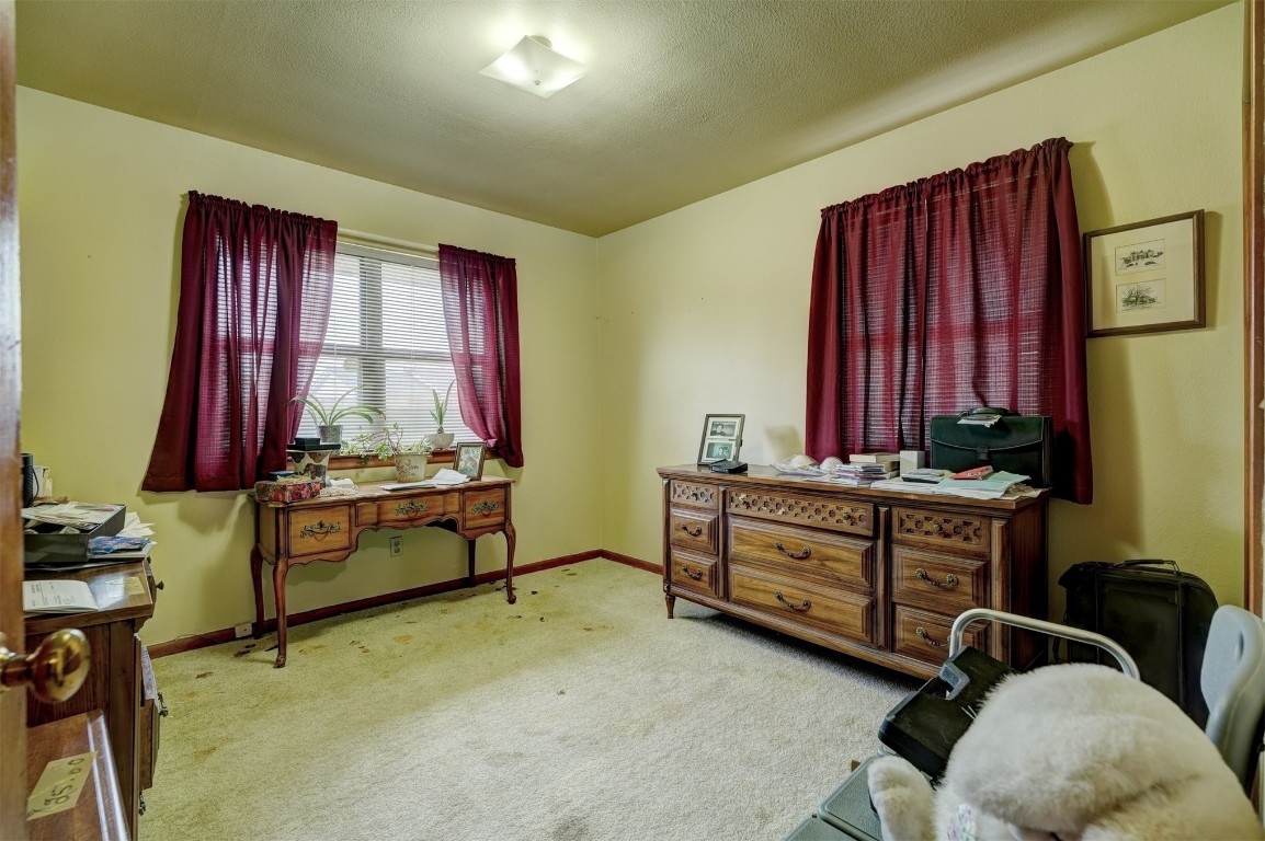 3809 NW 57th Street, Oklahoma City, OK 73112 living area featuring carpet floors