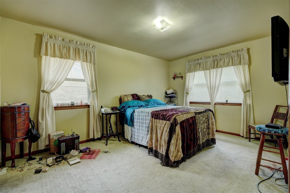 3809 NW 57th Street, Oklahoma City, OK 73112 bedroom with carpet