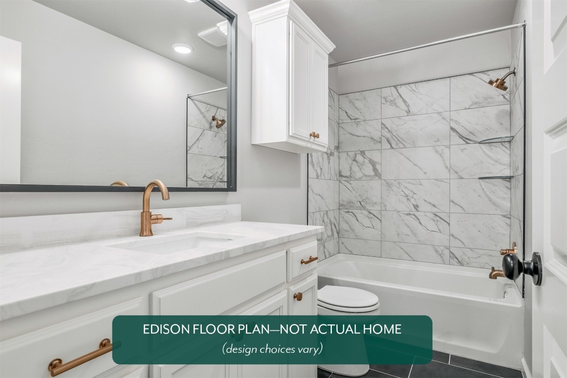 8525 Cassian Drive, Oklahoma City, OK 73135 full bathroom featuring tile flooring, oversized vanity, tiled shower / bath combo, and toilet