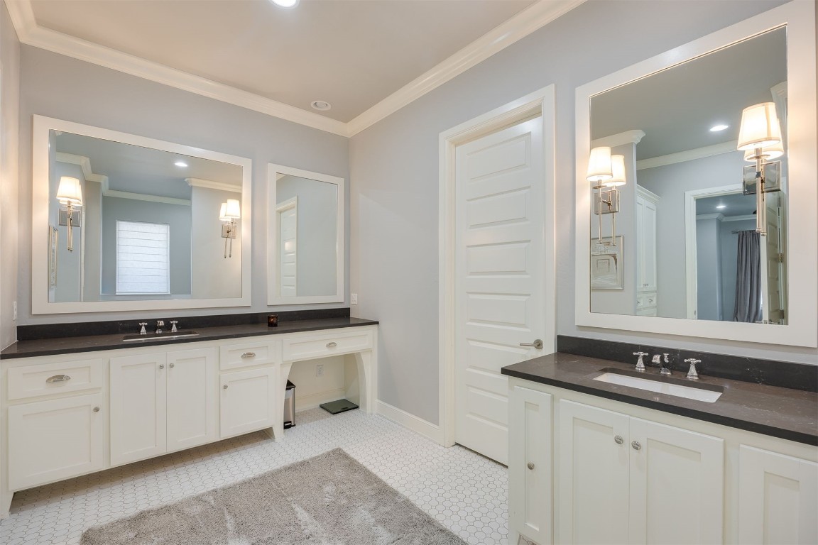 6332 Wentworth Drive, Edmond, OK 73025 bathroom featuring tile flooring, vanity, and ornamental molding