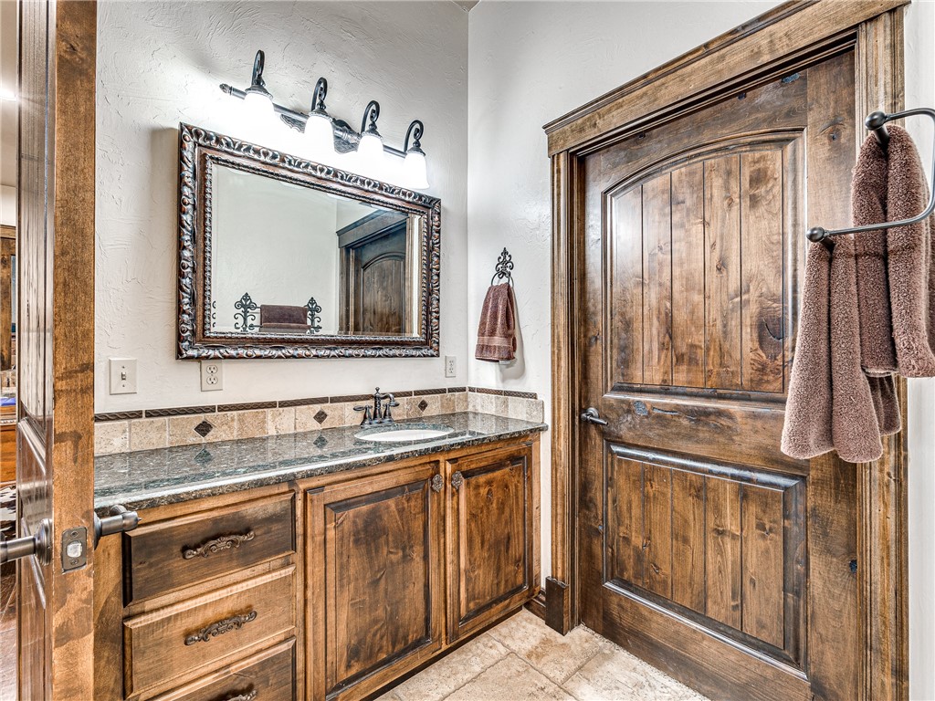 3624 Winding Lake Circle, Arcadia, OK 73007 bathroom with tile floors and oversized vanity