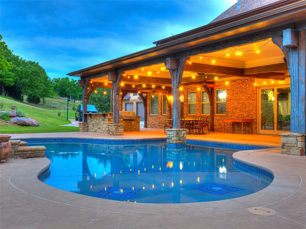 3624 Winding Lake Circle, Arcadia, OK 73007 view of swimming pool featuring a patio, ceiling fan, exterior kitchen, and a grill