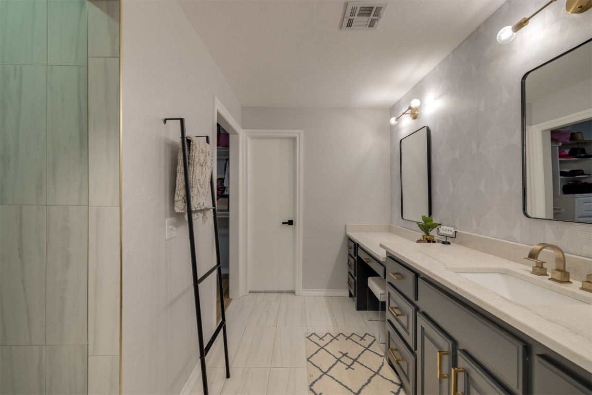 6001 Acorn Drive, Oklahoma City, OK 73151 bathroom featuring tile floors and oversized vanity