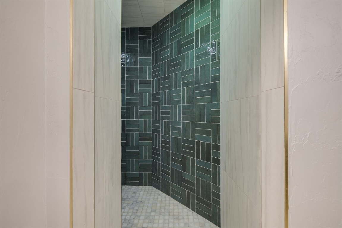 6001 Acorn Drive, Oklahoma City, OK 73151 bathroom featuring tiled shower