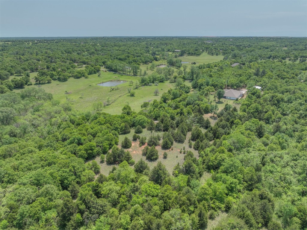 6001 Acorn Drive, Oklahoma City, OK 73151 drone / aerial view featuring a water view