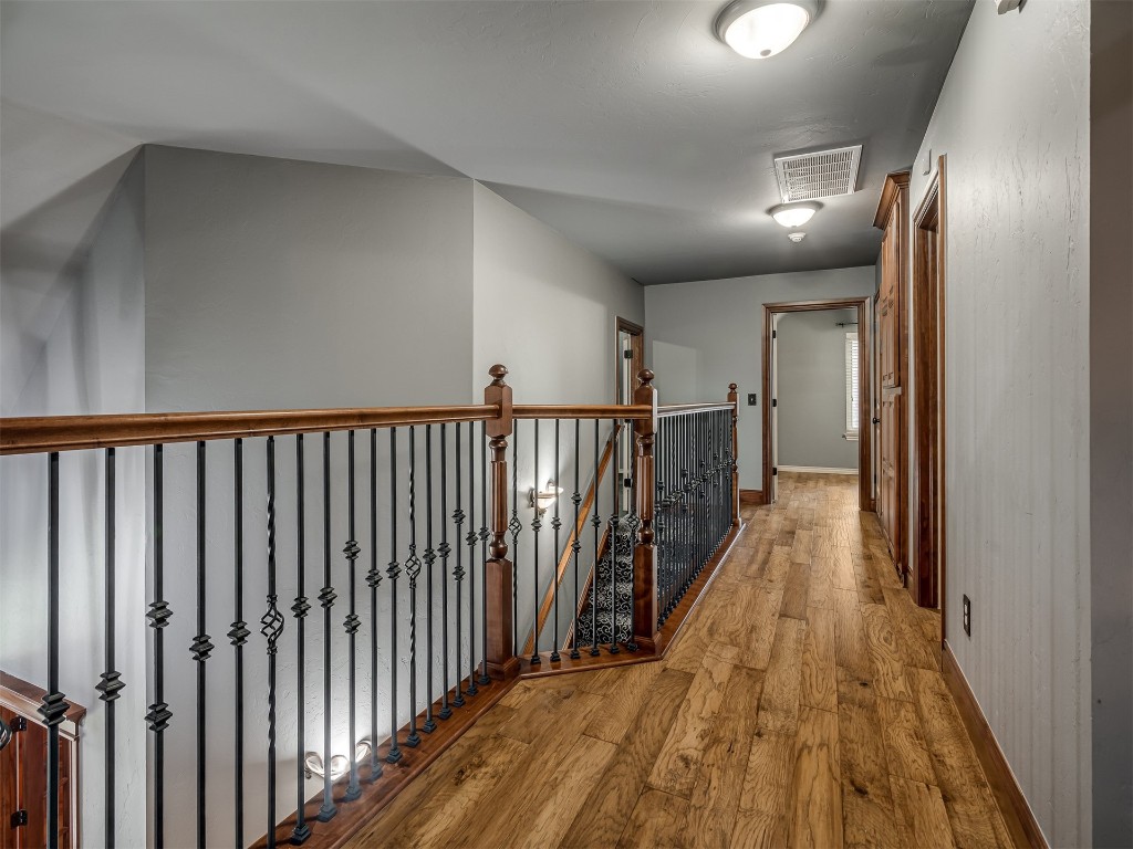 1517 SW 132nd Street, Oklahoma City, OK 73170 corridor featuring hardwood / wood-style flooring