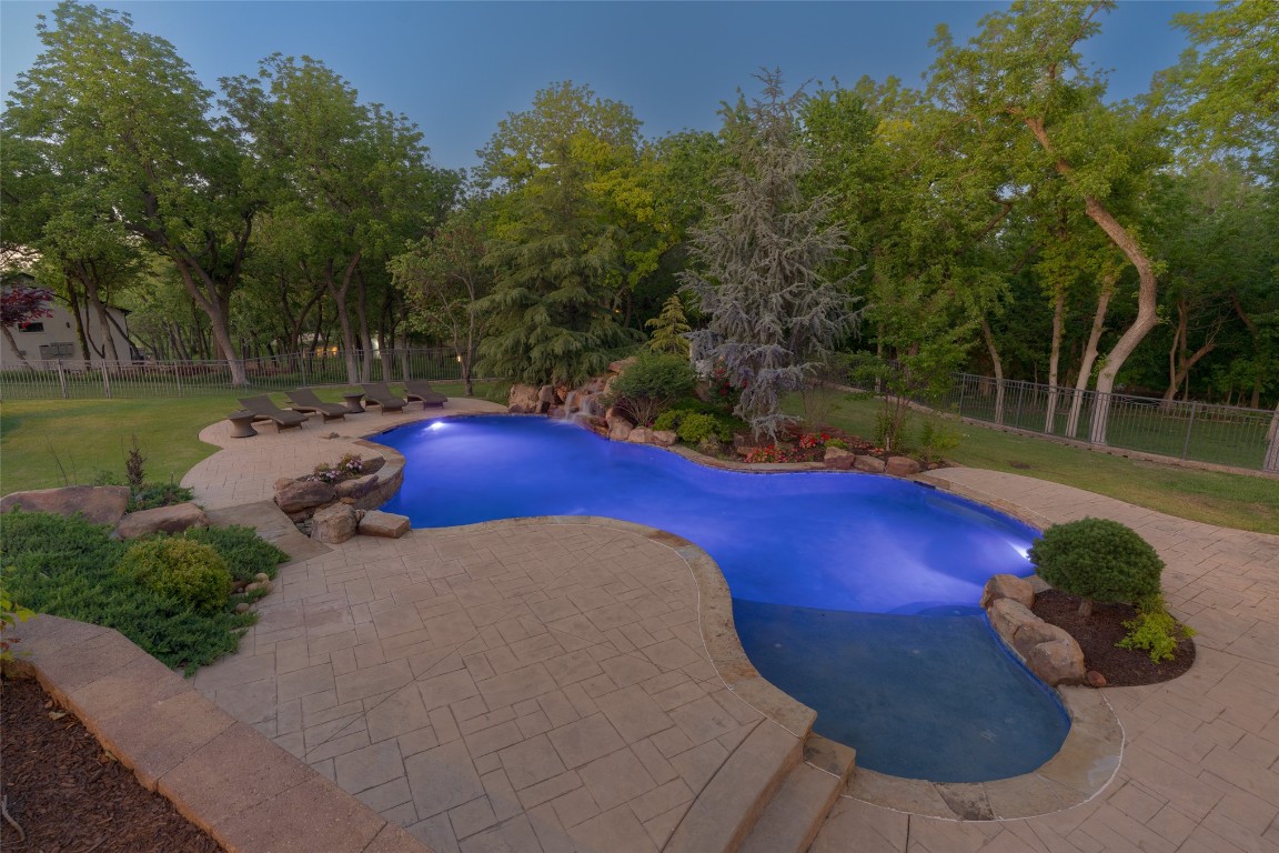 1200 Settlers Drive, Edmond, OK 73034 view of swimming pool with a patio area