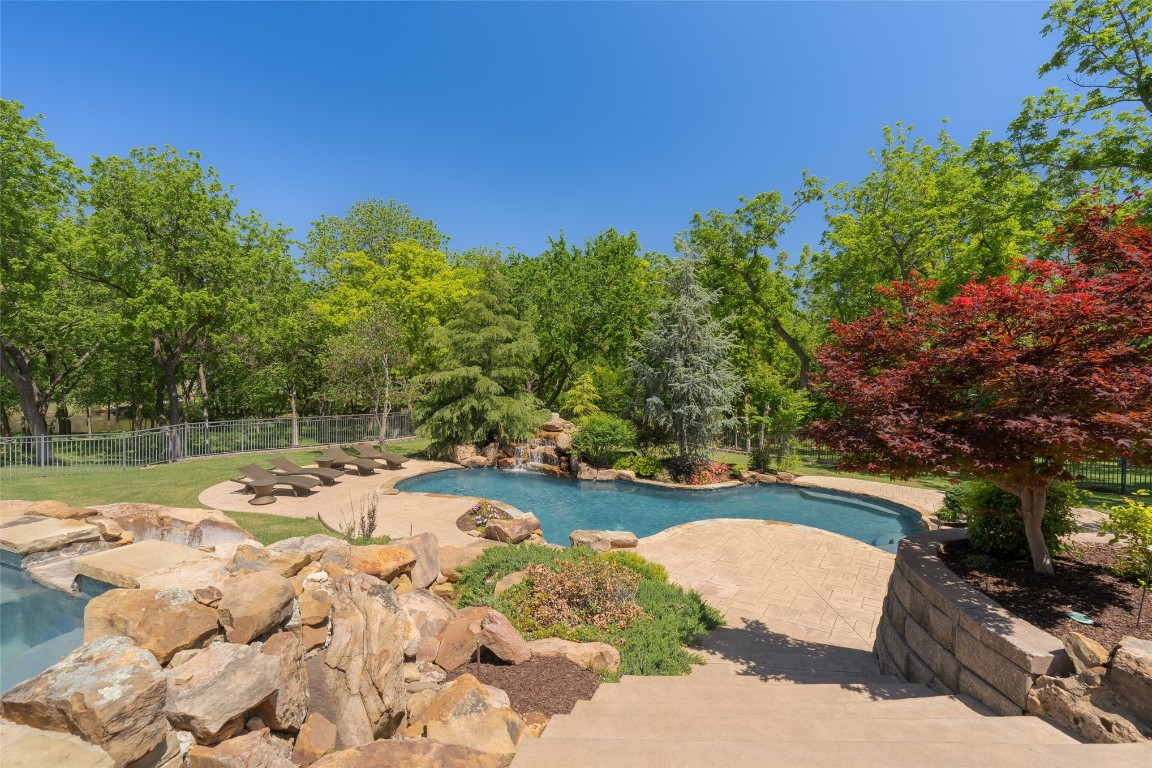 1200 Settlers Drive, Edmond, OK 73034 view of swimming pool featuring a patio