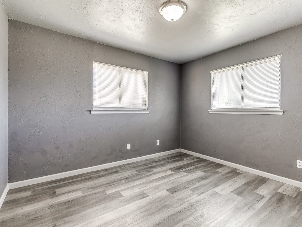 427 W Fairchild Drive, Midwest City, OK 73110 unfurnished room featuring light hardwood / wood-style flooring