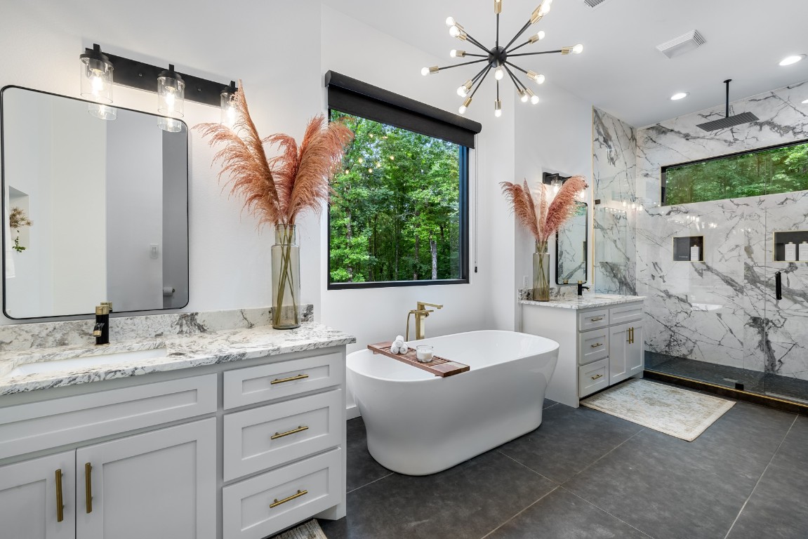 401 Gentry Oak Lane, Broken Bow, OK 74728 bathroom featuring dual sinks, oversized vanity, and tile flooring