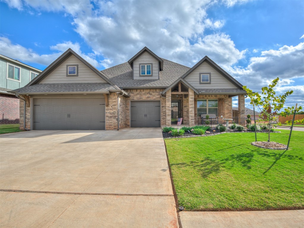1600 NE 33rd Terrace, Moore, OK 73160 craftsman inspired home with a garage and a front lawn