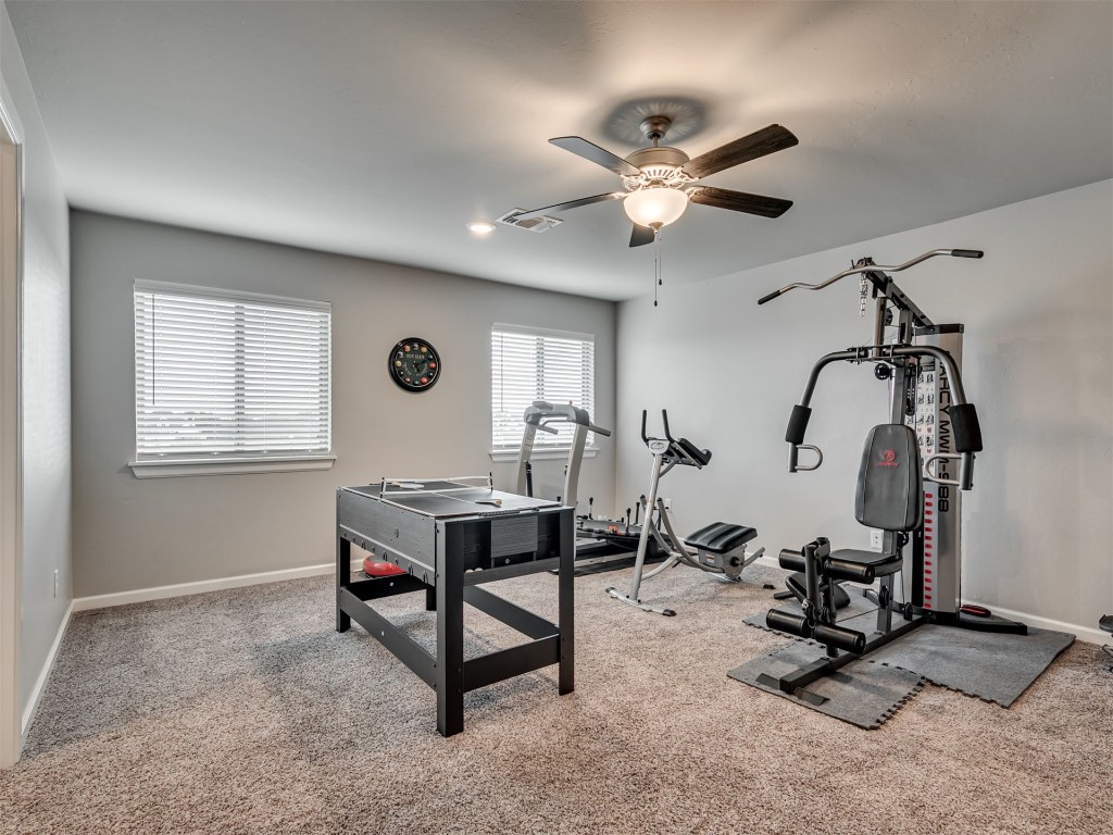 1600 NE 33rd Terrace, Moore, OK 73160 workout area with ceiling fan and carpet