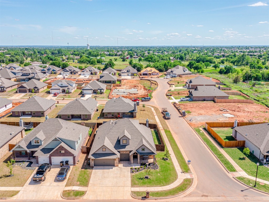 1600 NE 33rd Terrace, Moore, OK 73160 birds eye view of property with a water view