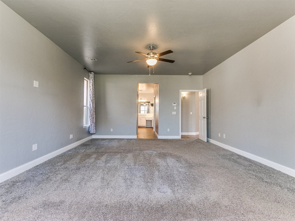 916 Hunters Pointe Road, Edmond, OK 73003 hallway featuring light hardwood / wood-style flooring