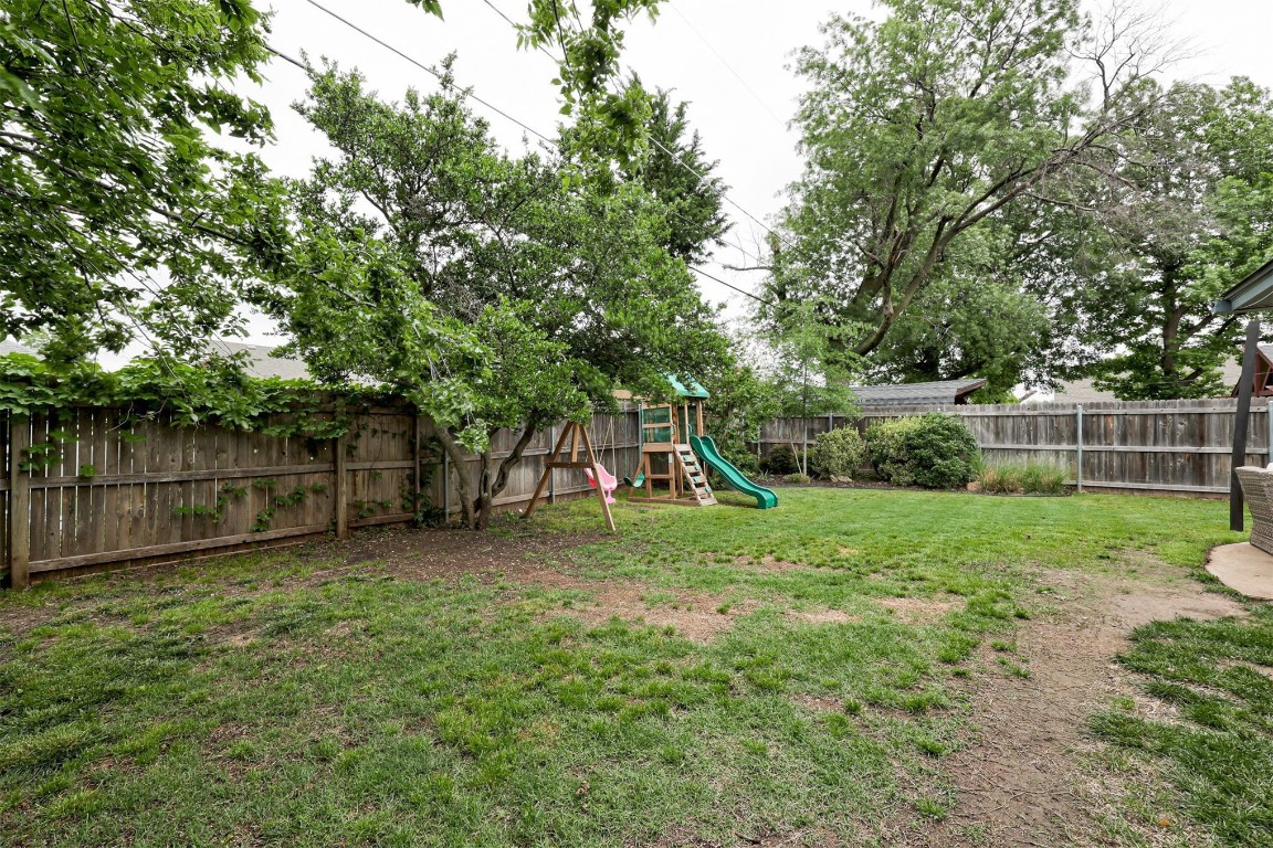 2509 NW 58th Street, Oklahoma City, OK 73112 view of yard with a playground
