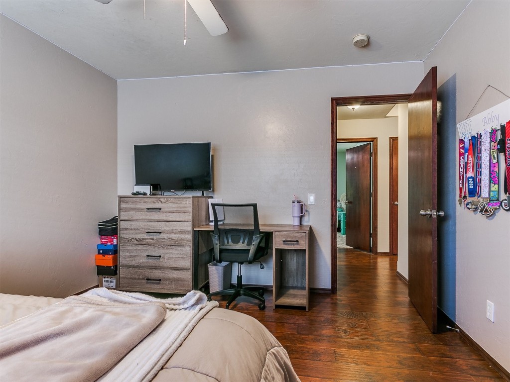 17001 Kemble Lane, Edmond, OK 73012 bedroom featuring ceiling fan and dark hardwood / wood-style floors