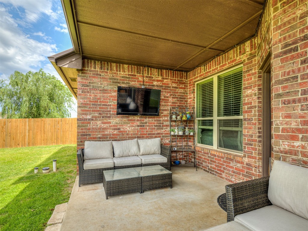 9117 NW 139th Street, Yukon, OK 73099 view of patio with an outdoor hangout area