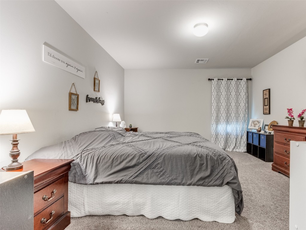 3829 Palio Lane, Oklahoma City, OK 73179 bedroom with carpet