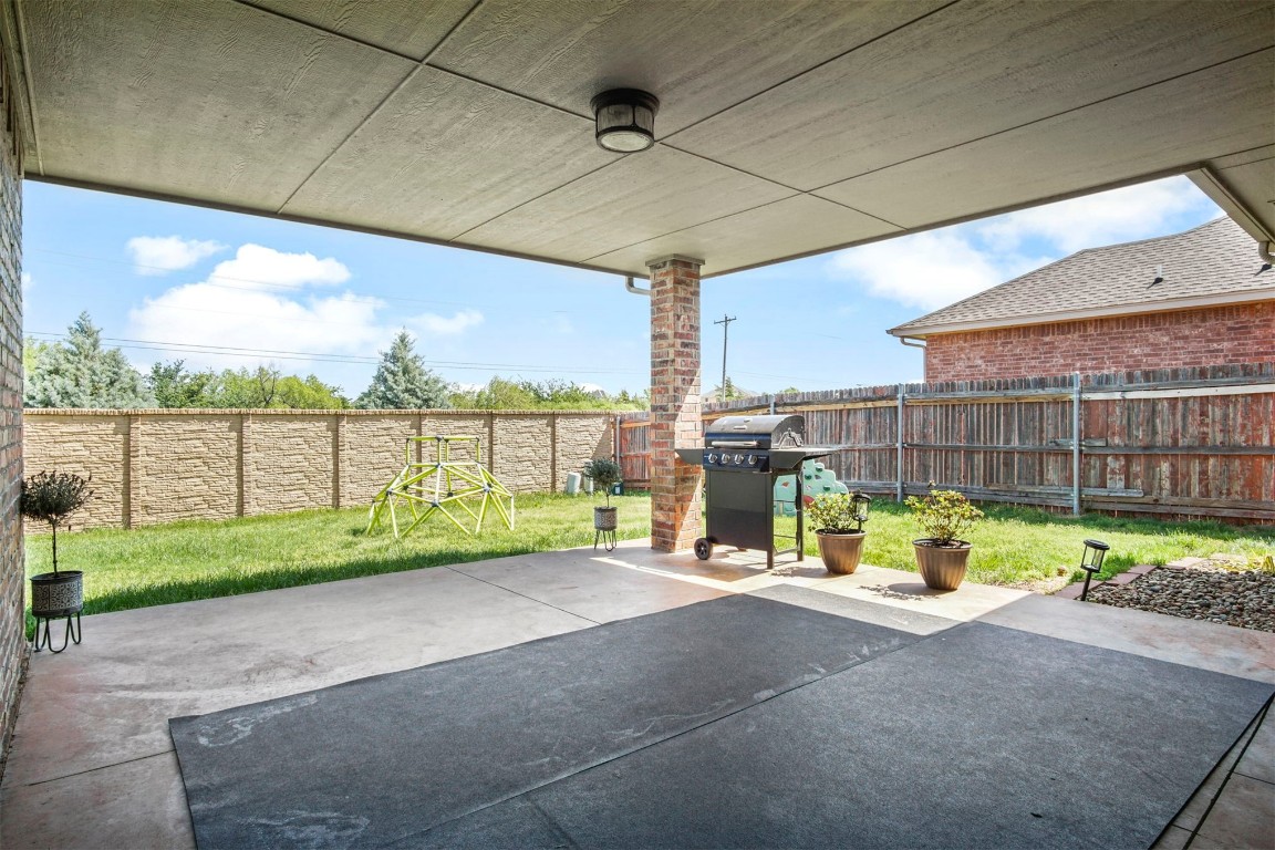 3405 NW 164th Street, Edmond, OK 73013 view of patio / terrace with area for grilling