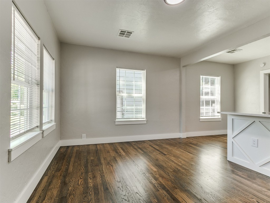 2213 NW 31 Street, #4056278939, Oklahoma City, OK 73112 unfurnished room with dark hardwood / wood-style floors