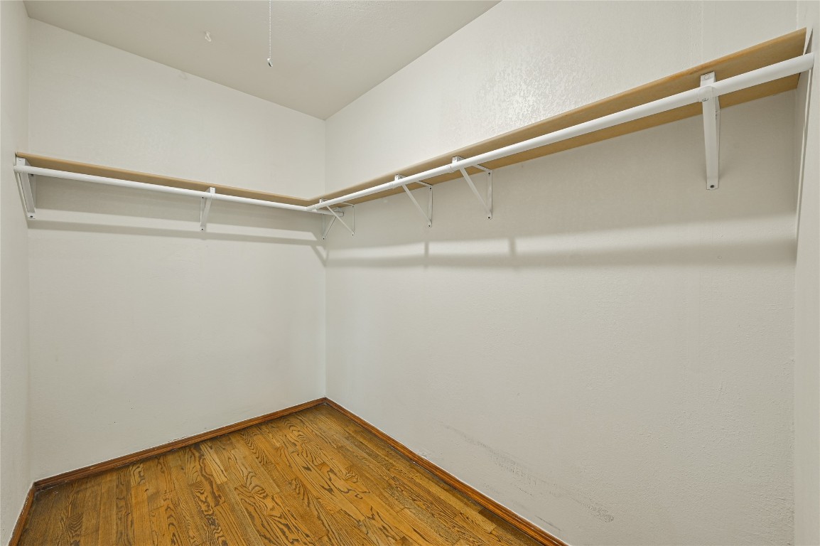 3013 SW 28th Street, Oklahoma City, OK 73108 spacious closet with hardwood / wood-style floors