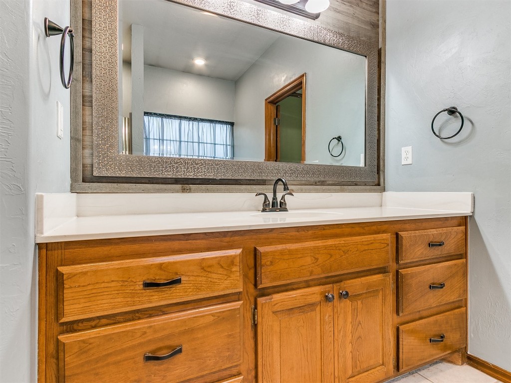 1400 NW 9th Street, Moore, OK 73170 bathroom featuring vanity
