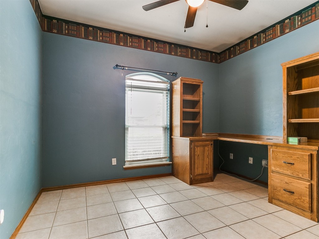 1400 NW 9th Street, Moore, OK 73170 unfurnished office with built in desk, ceiling fan, and light tile floors