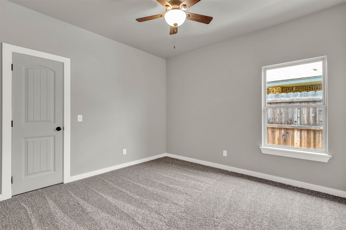 2105 Valley View, Weatherford, OK 73096 spare room with carpet floors and ceiling fan